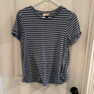 Universal thread striped tee.